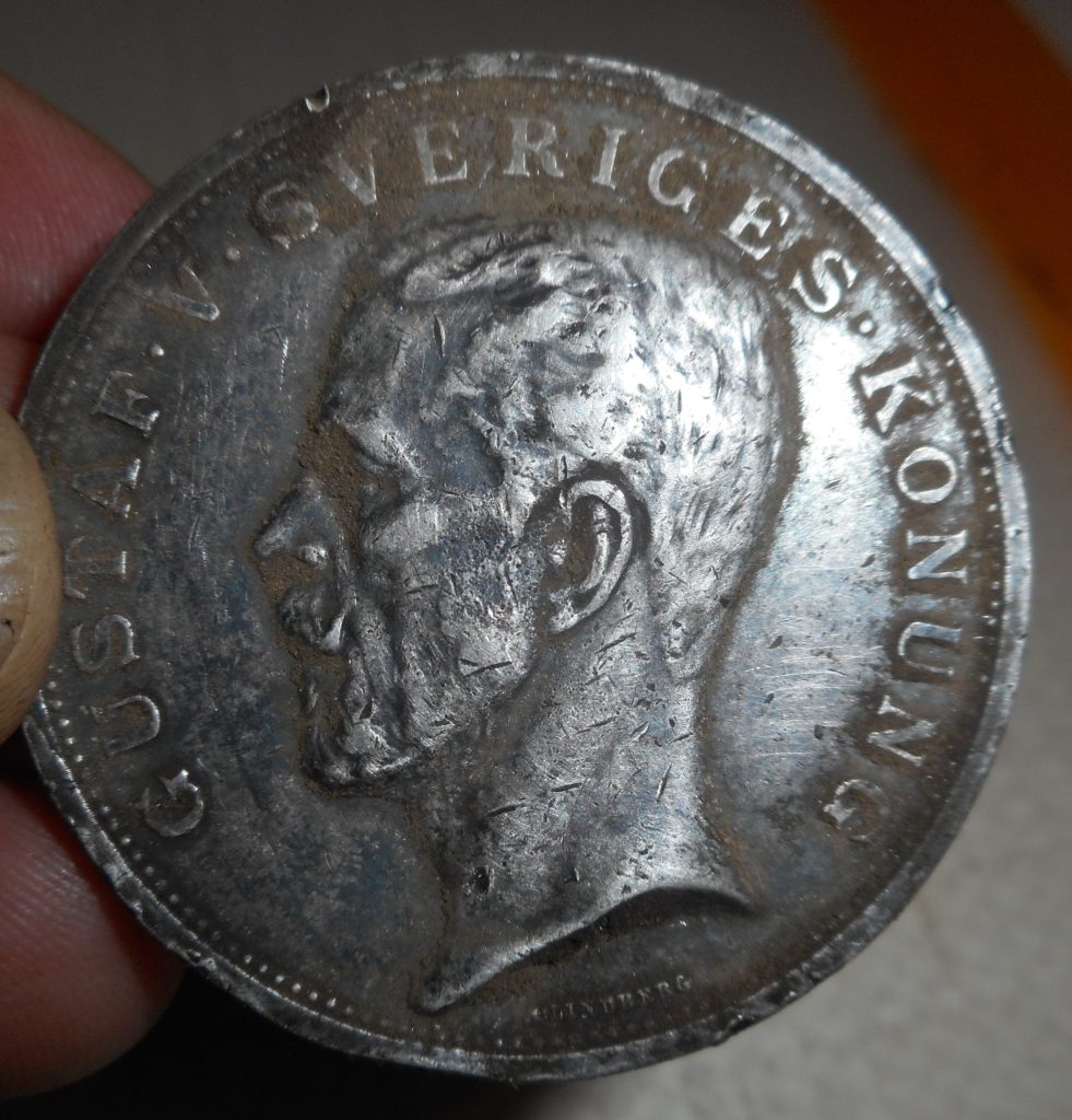 Obverse of silver Swedish commemorative coin from 1909- found in Newton.