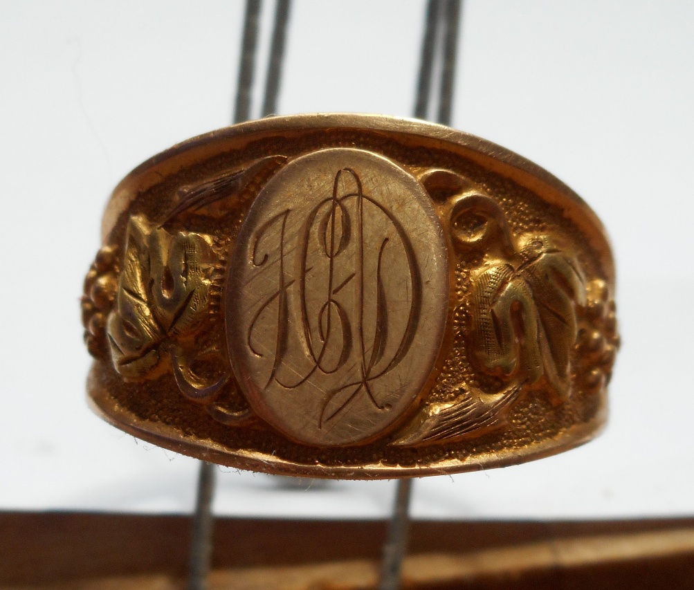 Awesome gold ring found in New Bedford- FCAD engraved??