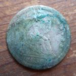 1850-O Seated Liberty Half dime, stained from being stuck to a Nova Scotia penny